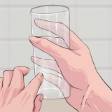 Fjerne avleiringer fra glass